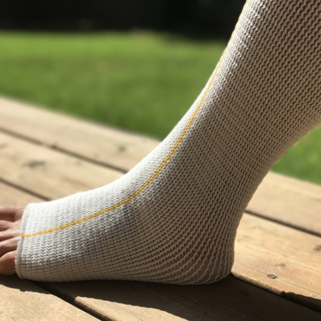 EA/1 EDEMAWEAR LYMPHEDEMA STOCKINET MEDIUM MAX LIMB CIRCUMFERENCE 75CM (30") LENGTH 86CM (34") FOOT TO GROIN OR WRIST TO SHOULDER, YELLOW STRIPE, LONGITUDINAL COMPRESSION, LATEX-FREE - Save On Medical